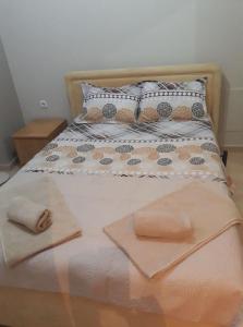En eller flere senge i et værelse på Tassos