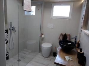 Koupelna v ubytování Amelia Apts & Rooms