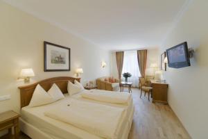Posteľ alebo postele v izbe v ubytovaní Vergeiner's Hotel Traube