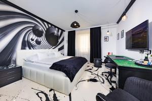 TV a/nebo společenská místnost v ubytování Hotel Freizeittempel