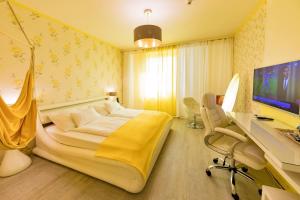 TV a/nebo společenská místnost v ubytování Hotel Freizeittempel