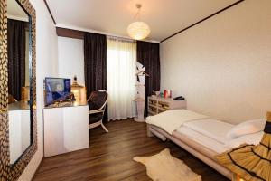 Postel nebo postele na pokoji v ubytování Hotel Freizeittempel
