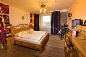 Postel nebo postele na pokoji v ubytování Hotel Freizeittempel