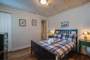 Postel nebo postele na pokoji v ubytování Auberge Sauvignon