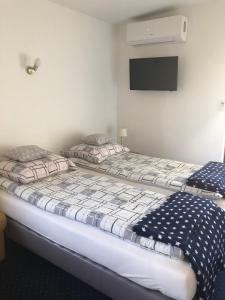 Posteľ alebo postele v izbe v ubytovaní Apartamenty Maria