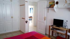 A television and/or entertainment centre at Costa Alegria B2