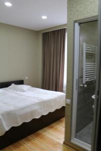 Katil atau katil-katil dalam bilik di Guesthouse Suja