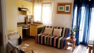 A kitchen or kitchenette at Costa Alegria B2
