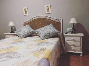 Postel nebo postele na pokoji v ubytování Hostal El Espinel