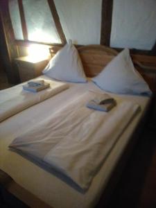 Postel nebo postele na pokoji v ubytování Gasthaus Sonne