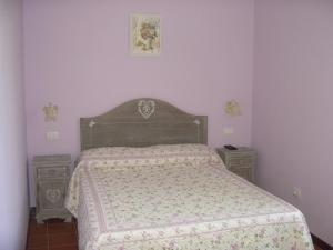 Voodi või voodid majutusasutuse Hotel Paese Corvara toas