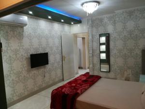 Apartment at Milsa Nasr City, Building No. 36にあるベッド