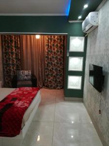 Een bed of bedden in een kamer bij Apartment at Milsa Nasr City, Building No. 36