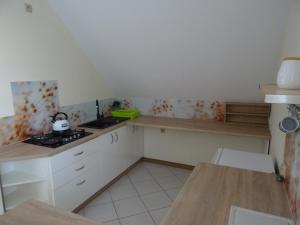 Kuchnia lub aneks kuchenny w obiekcie Cicha 10 Na górze