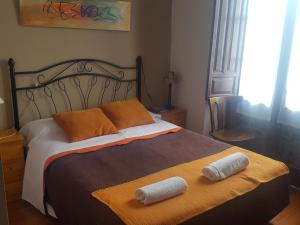 Postel nebo postele na pokoji v ubytování Hotel Asturias