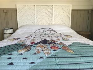 A bed or beds in a room at Lo Chalet dell'Artista