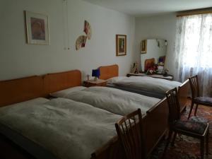 เตียงในห้องที่ albergovalbella