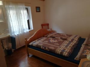 Tempat tidur dalam kamar di albergovalbella