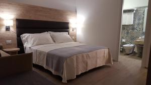 Postel nebo postele na pokoji v ubytování B&B Vanessa