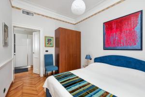 Ein Bett oder Betten in einem Zimmer der Unterkunft San Zaccaria Apartment