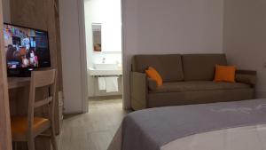 TV a/nebo společenská místnost v ubytování B&B Vanessa