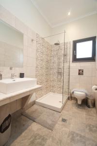 Ett badrum på Vista Blu Villa