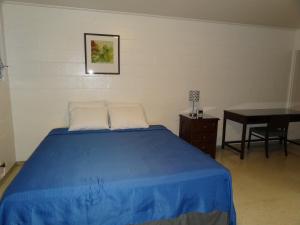 Postel nebo postele na pokoji v ubytování Tip Top Motel
