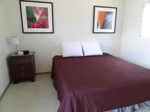 Postel nebo postele na pokoji v ubytování Tip Top Motel