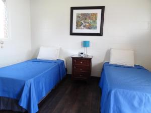 Postel nebo postele na pokoji v ubytování Tip Top Motel