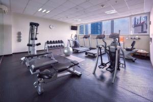 a gym with treadmills and machines in a building at Wyndham Garden Mexico City - Polanco in Mexico City