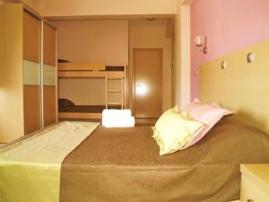Кровать или кровати в номере Maranton Beach Hotel