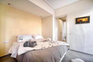 Posteľ alebo postele v izbe v ubytovaní Elea Athens Apartment