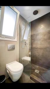 Kúpeľňa v ubytovaní Elea Athens Apartment
