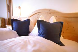 A bed or beds in a room at Garni La Ciasota 3s