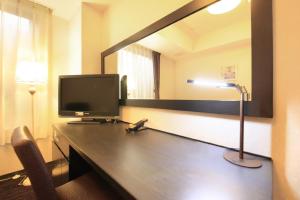 TV a/nebo společenská místnost v ubytování Hotel Coco Grand Kitasenju