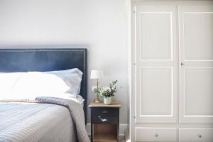 Postel nebo postele na pokoji v ubytování Palazzetto Foscari