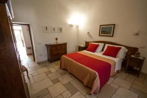 Postel nebo postele na pokoji v ubytování Il Palmento Hotel Relais