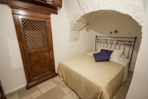 Postel nebo postele na pokoji v ubytování Il Palmento Hotel Relais