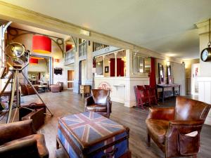 Posezení v ubytování Brit Hotel Essentiel Cholet