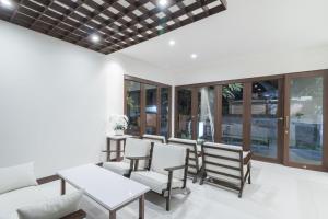 Posezení v ubytování Kak Garden Inn