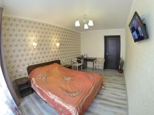 Cama ou camas em um quarto em Hotel Katrin