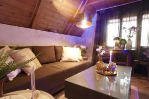 A seating area at Nadi's Holiday Home – Heart of Woods, Szentendre Island