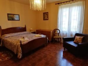 Postel nebo postele na pokoji v ubytování maximum house in subbiano