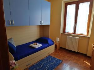 Postel nebo postele na pokoji v ubytování maximum house in subbiano