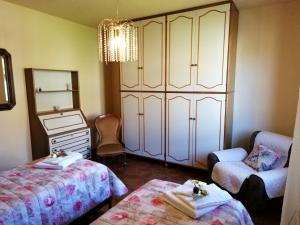 Postel nebo postele na pokoji v ubytování maximum house in subbiano
