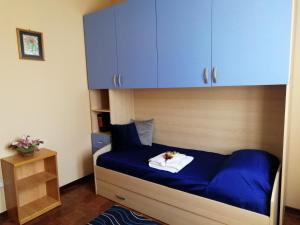 Postel nebo postele na pokoji v ubytování maximum house in subbiano