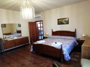 Postel nebo postele na pokoji v ubytování maximum house in subbiano