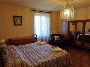 Postel nebo postele na pokoji v ubytování maximum house in subbiano
