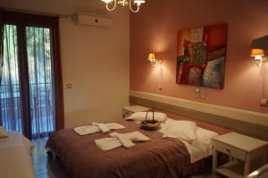 A bed or beds in a room at Nontas Home