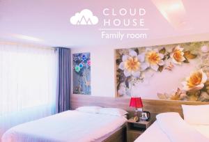 Postel nebo postele na pokoji v ubytování Cloud House Sapa